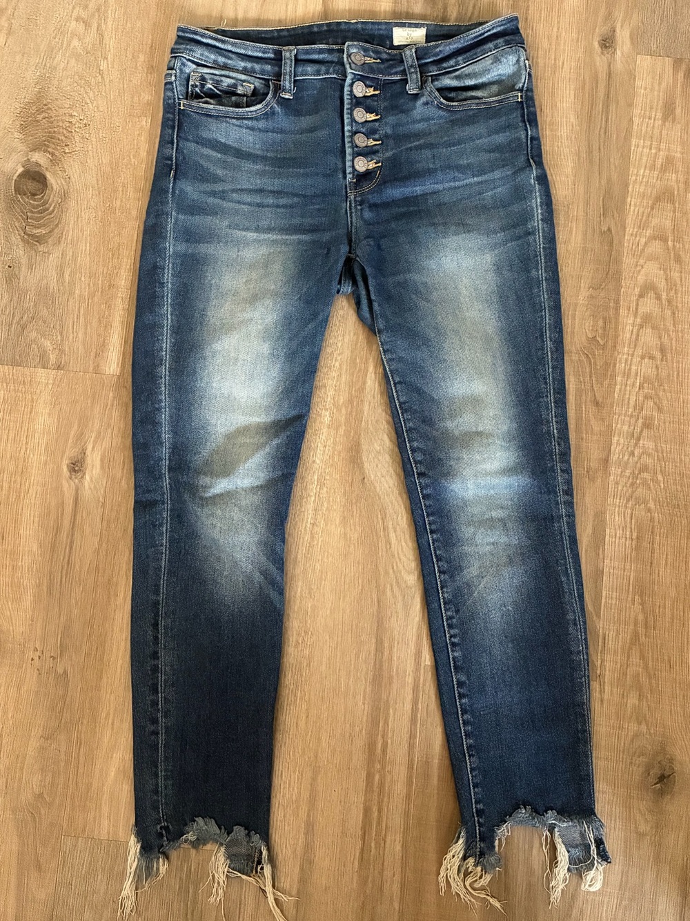 Skinny Blue Washed Jeans with Button-Fly and Frayed Hem